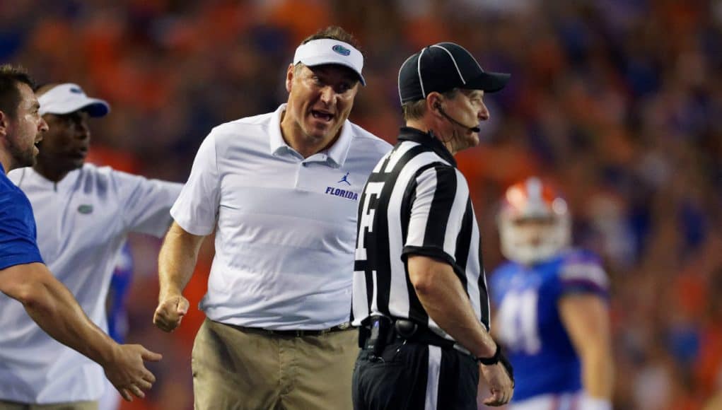 Florida Gators head coach Dan Mullen talks to the referee during the Kentucky game - 1280x853