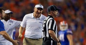 Florida Gators head coach Dan Mullen talks to the referee during the Kentucky game - 1280x853