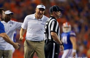 Florida Gators head coach Dan Mullen talks to the referee during the Kentucky game - 1280x853