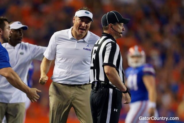 Florida Gators head coach Dan Mullen talks to the referee during the Kentucky game - 1280x853