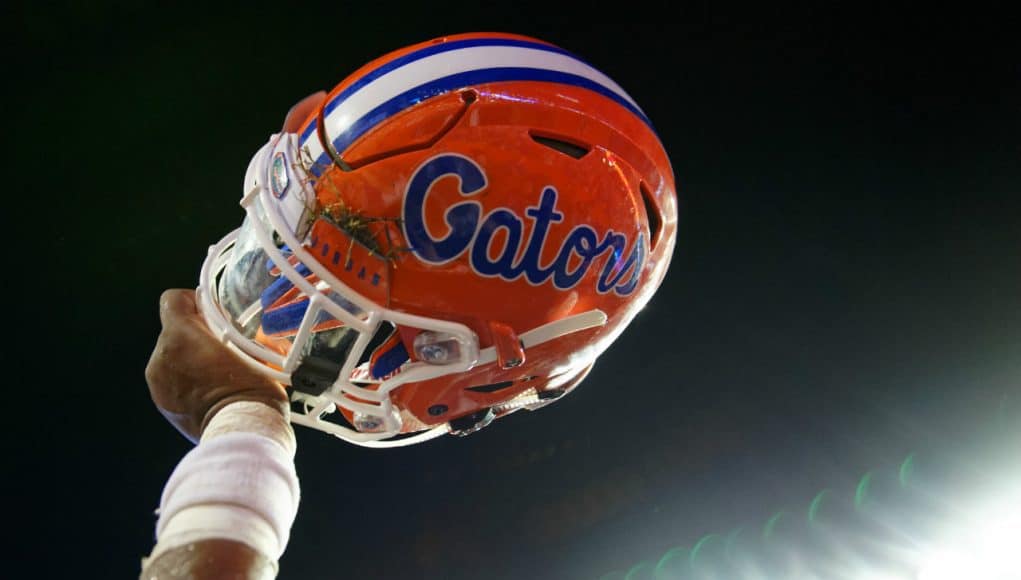 Florida Gators helmet raised in the air after defeating Charleston Southern- 1280x852