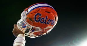 Florida Gators helmet raised in the air after defeating Charleston Southern- 1280x852