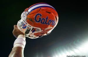 Florida Gators helmet raised in the air after defeating Charleston Southern- 1280x852