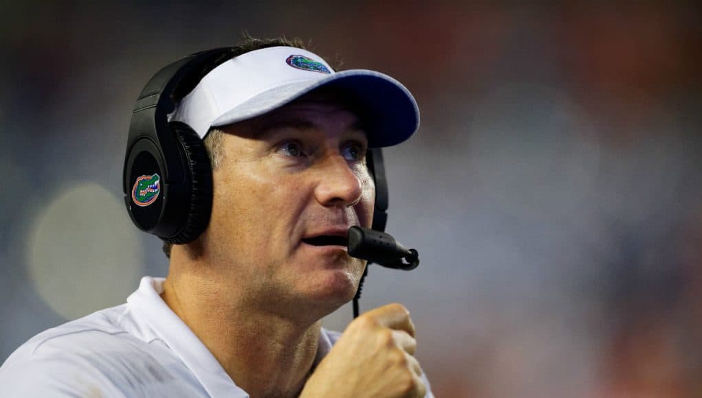 University of Florida head coach Dan Mullen calling in a play during the Florida Gators 53-6 win over Charleston Southern- Florida Gators football- 1280x853