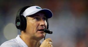 University of Florida head coach Dan Mullen calling in a play during the Florida Gators 53-6 win over Charleston Southern- Florida Gators football- 1280x853
