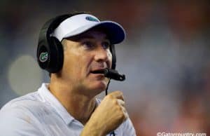 University of Florida head coach Dan Mullen calling in a play during the Florida Gators 53-6 win over Charleston Southern- Florida Gators football- 1280x853