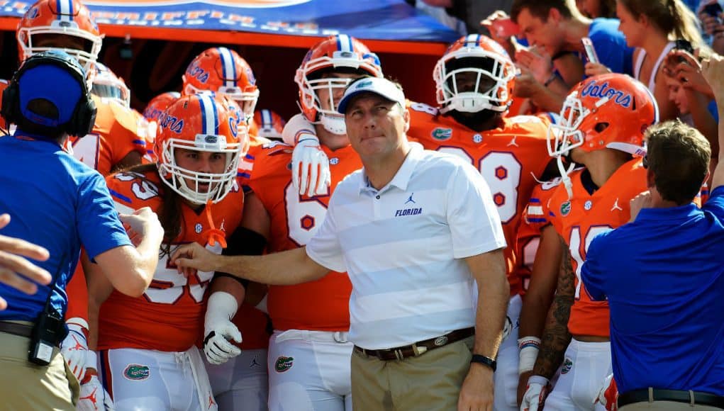 University of Florida head coach Dan Mullen waits with his team before they take the field for a game against Colorado State- Florida Gators football- 1280x852