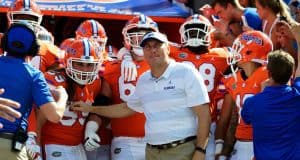 University of Florida head coach Dan Mullen waits with his team before they take the field for a game against Colorado State- Florida Gators football- 1280x852