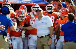 University of Florida head coach Dan Mullen waits with his team before they take the field for a game against Colorado State- Florida Gators football- 1280x852