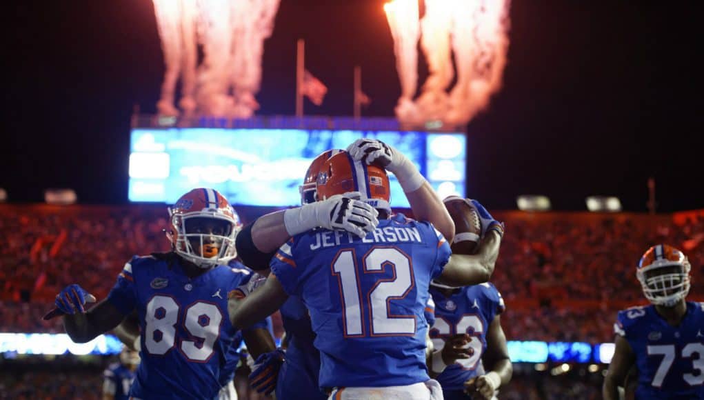 University of Florida receiver Van Jefferson celebrates with teammates after catching a jump pass for a touchdown- Florida Gators football- 1280x853