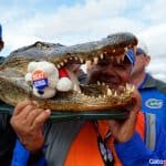 Florida Gators fans hold a Gator head before Gator Walk-1280x852