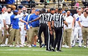 Florida Gators head coach Dan Mullen yells at Vanderbilt coach Derek Mason- 1280x800