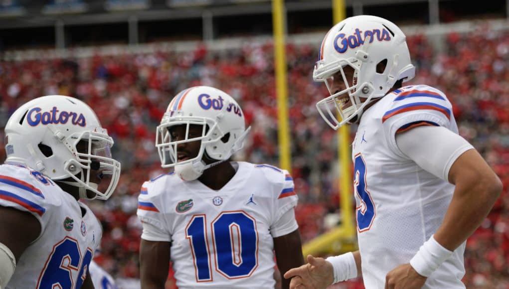 Florida Gators quarterback Feleipe Franks celebrates with Josh Hammond against UGA- 1280x853