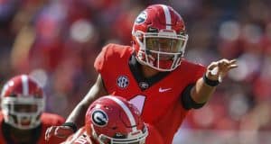Sep 1, 2018; Athens, GA, USA; Georgia Bulldogs quarterback Justin Fields (1) calls a play behind center Lamont Gaillard (53) against the Austin Peay Governors during the first half at Sanford Stadium. Mandatory Credit: Dale Zanine-USA TODAY Sports