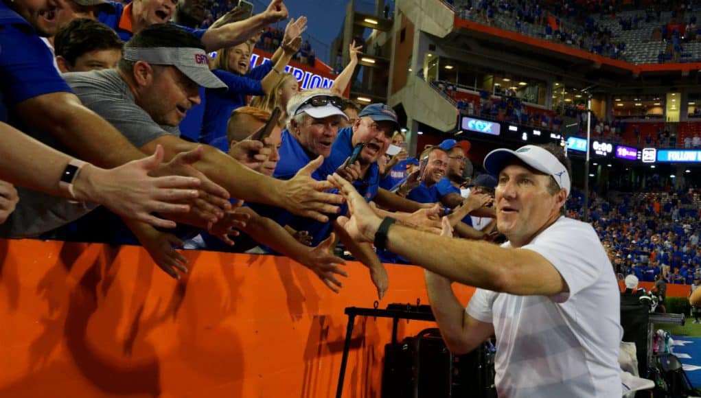 University of Florida head coach Dan Mullen does a victory lap around Ben Hill Griffin Stadium after the Florida Gators win over LSU- Florida Gators football- 1280x852