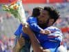 Florida Gators defensive lineman Cece Jefferson holds his son during senior day- 1280x1024