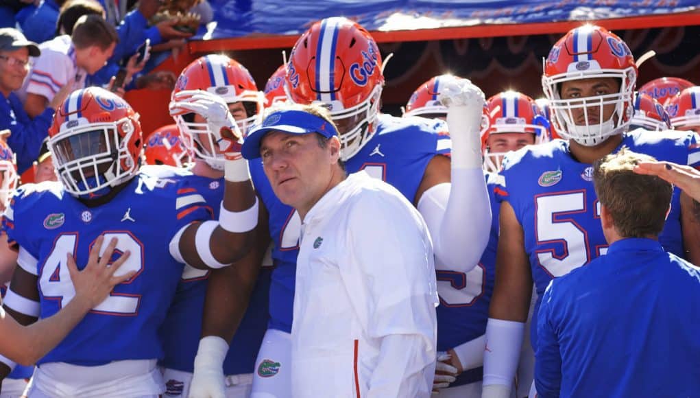 Florida Gators head coach Dan Mullen and the team enter the Swamp before Idaho-1280x852