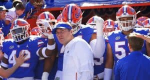 Florida Gators head coach Dan Mullen and the team enter the Swamp before Idaho-1280x852