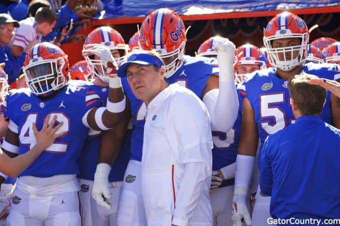 Florida Gators head coach Dan Mullen and the team enter the Swamp before Idaho-1280x852