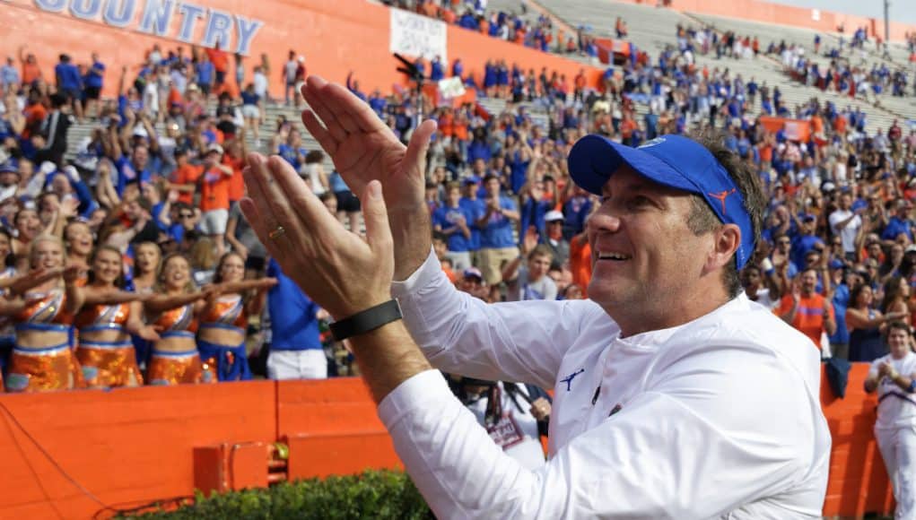 Florida Gators head coach Dan Mullen does the Gator Chomp after South Carolina- 1280x852