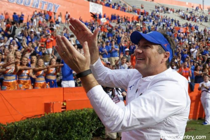 Florida Gators head coach Dan Mullen does the Gator Chomp after South Carolina- 1280x852