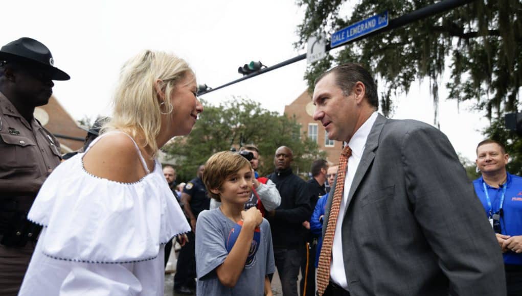Florida Gators head coach Dan Mullen talks to his wife before the South Carolina game- 1280x853