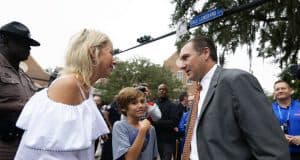 Florida Gators head coach Dan Mullen talks to his wife before the South Carolina game- 1280x853