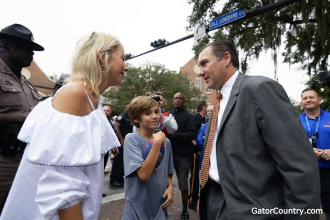 Florida Gators head coach Dan Mullen talks to his wife before the South Carolina game- 1280x853