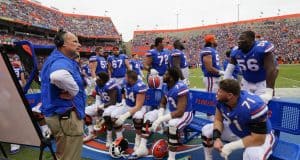 Florida Gators offensive line coach John Hevesy talks to the offensive line- 1280x852