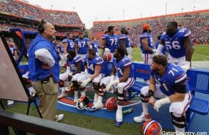 Florida Gators offensive line coach John Hevesy talks to the offensive line- 1280x852