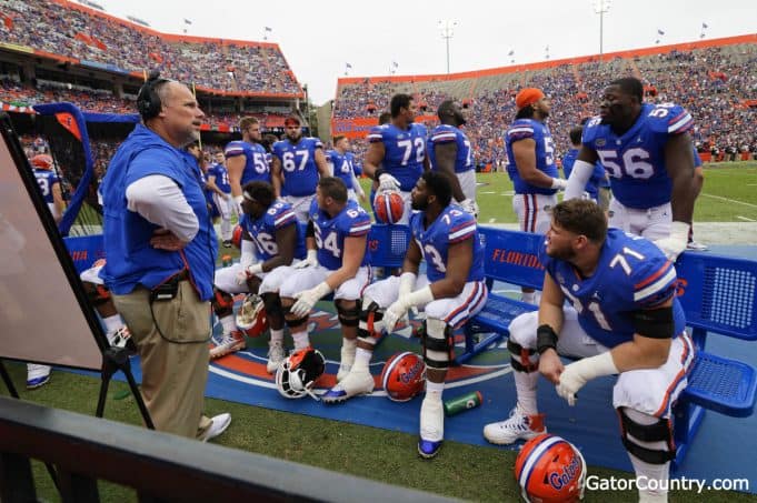 Florida Gators offensive line coach John Hevesy talks to the offensive line- 1280x852