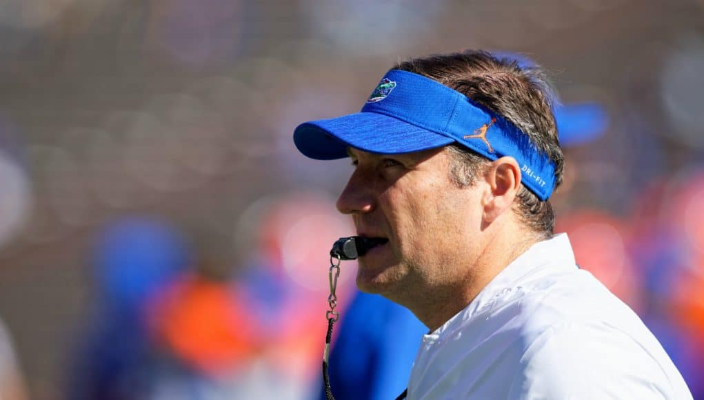 University of Florida head coach Dan Mullen watches the Florida Gators arm up prior to their 2018 game against Idaho- Florida Gators football- 1280x853