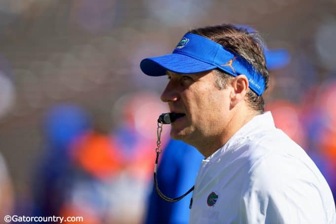 University of Florida head coach Dan Mullen watches the Florida Gators arm up prior to their 2018 game against Idaho- Florida Gators football- 1280x853