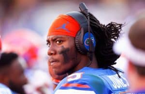 University of Florida quarterback Emory Jones on the headset with quarterback coach Brian Johnson during a win over Idaho- Florida Gators football- 1280x853