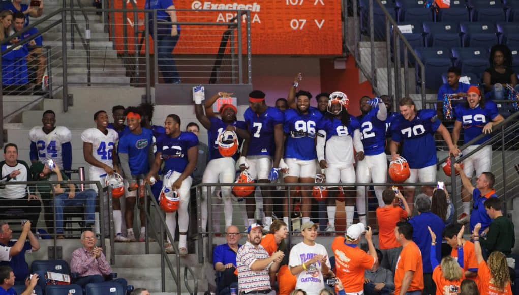 Florida Gators Football team watches the basketball game after practice- 1280x853