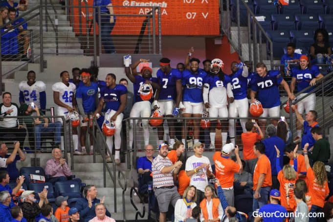Florida Gators Football team watches the basketball game after practice- 1280x853