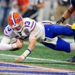 Florida Gators quarterback Feleipe Franks dives for a touchdown against Michigan-1280x853