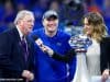 University of Florida head coach Dan Mullen accepts the Chick-fil-A Peach Bowl trophy after the Gators’ 41-15 win over Michigan- Florida Gators football- 1280x853