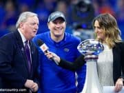 University of Florida head coach Dan Mullen accepts the Chick-fil-A Peach Bowl trophy after the Gators’ 41-15 win over Michigan- Florida Gators football- 1280x853
