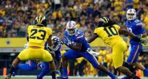 University of Florida running back Lamical Perine carries the ball in the AdvoCare Classic against the Michigan Wolverines- Florida Gators football- 1280x852