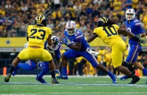 University of Florida running back Lamical Perine carries the ball in the AdvoCare Classic against the Michigan Wolverines- Florida Gators football- 1280x852