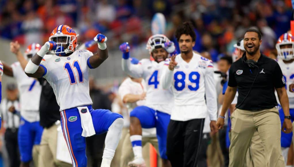 University of Florida linebacker Vosean Joseph celebrates during the Florida Gators Peach Bowl win over the Michigan Wolverines- Florida Gators football- 1280x1024