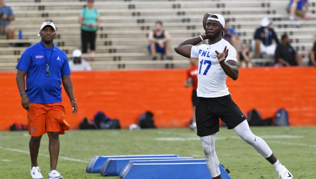 University of Florida quarterback Jalon Jones works out in front of quarterback coach Brian Johnson during Friday Night Lights- Florida Gators football- 1280x853