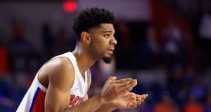 Florida Gators guard Jalen Hudson cheering his team on against Charleston Southern - 1280x853