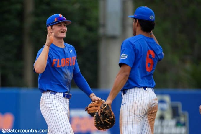 University of Florida freshmen Jud Fabian (left) and Kendrick Calilao (right) celebrate Florida’s series clinching win over Miami- Florida Gators baseball-1280x853