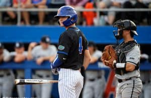 University of Florida outfielder Jud Fabian looks down to get a sign during the Florida Gators opening weekend win over Long Beach State- Florida Gators baseball- 1280x853