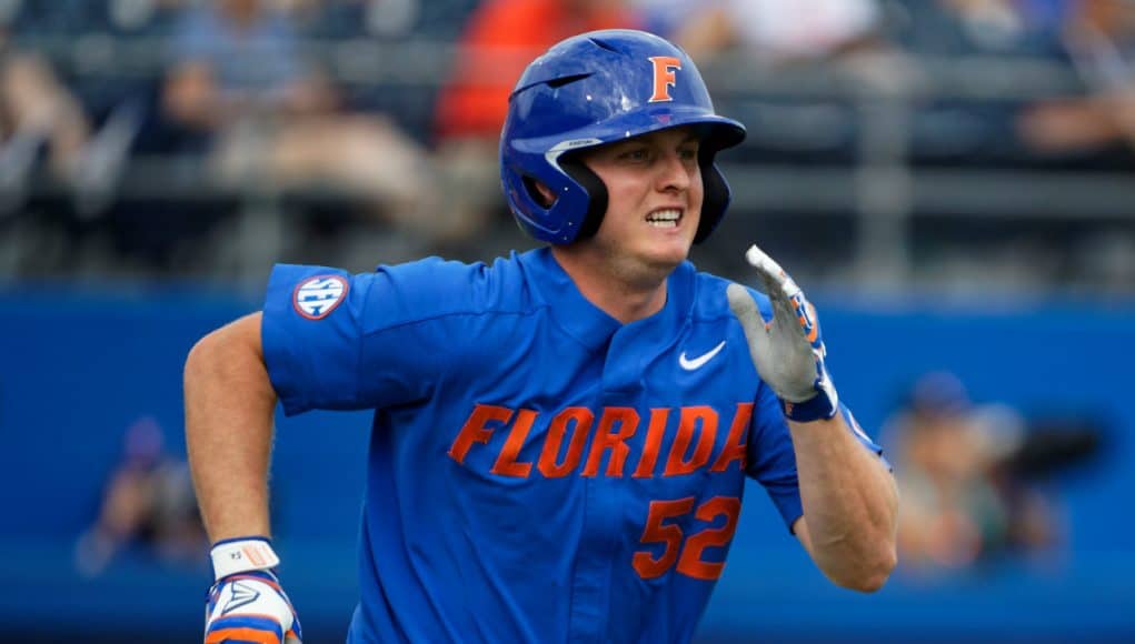 University of Florida junior Kirby McMullen runs out a ground ball against the Miami Hurricanes- Florida Gators baseball- 1280x853