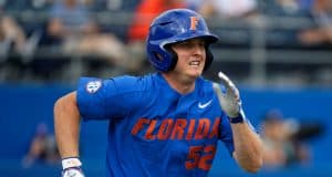 University of Florida junior Kirby McMullen runs out a ground ball against the Miami Hurricanes- Florida Gators baseball- 1280x853