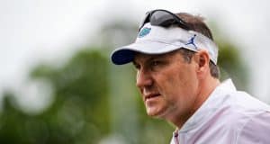 University of Florida head coach Dan Mullen looks on as his team practice during spring camp- Florida Gators football- 1280x853