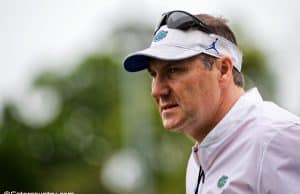 University of Florida head coach Dan Mullen looks on as his team practice during spring camp- Florida Gators football- 1280x853